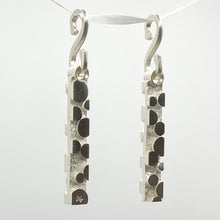 Load image into Gallery viewer, Rectangular earring dangles with bubble-like raised texture, hanging from s-hooks, three quarters view
